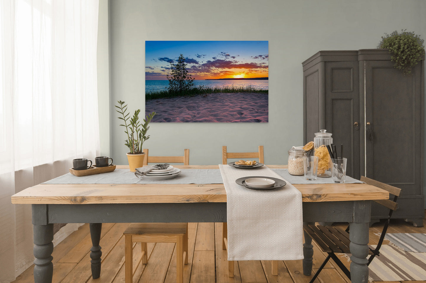 A Petoskey Sunset Michigan fine art print by Dennis Caskey in a dining room setting