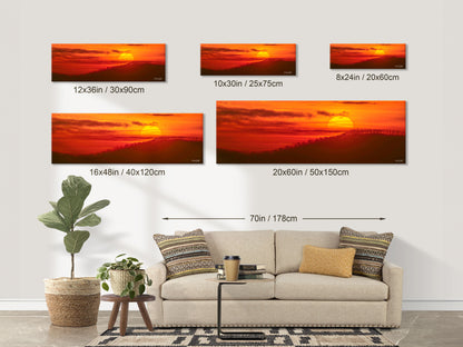 Size options for Radiant Hope fine art print displayed on a wall above a sofa, available in dimensions from 8x24 inches to 20x60 inches.