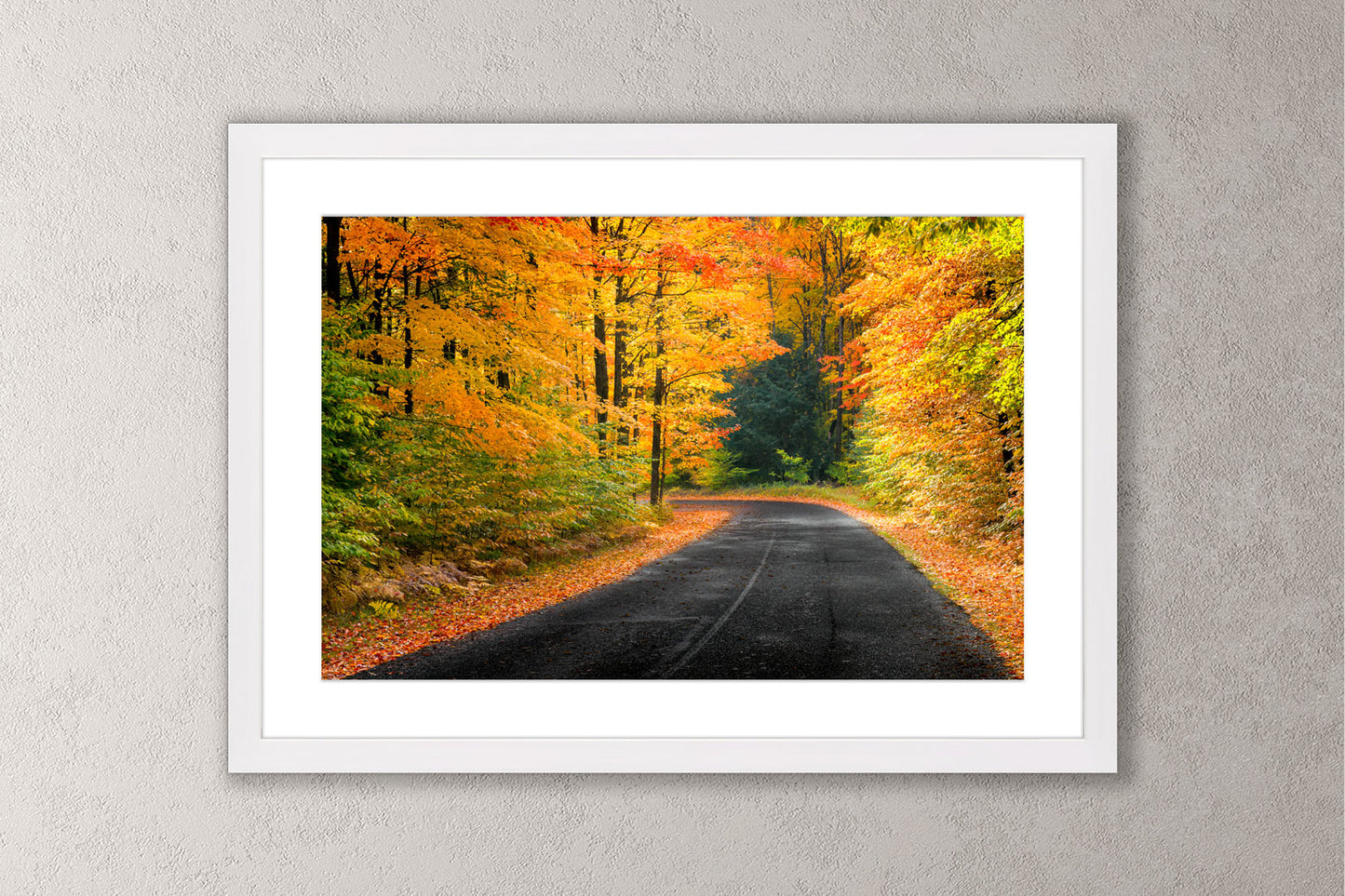 Autumn's Road Michigan fine art print in a large white frame by Dennis Caskey