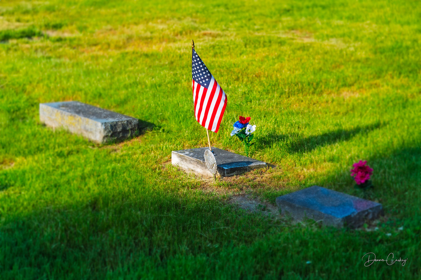 Memorial Day tribute with American flag, gravestones in Michigan cemetery, patriotic stock photo, Memorial Day photography, Michigan stock photo